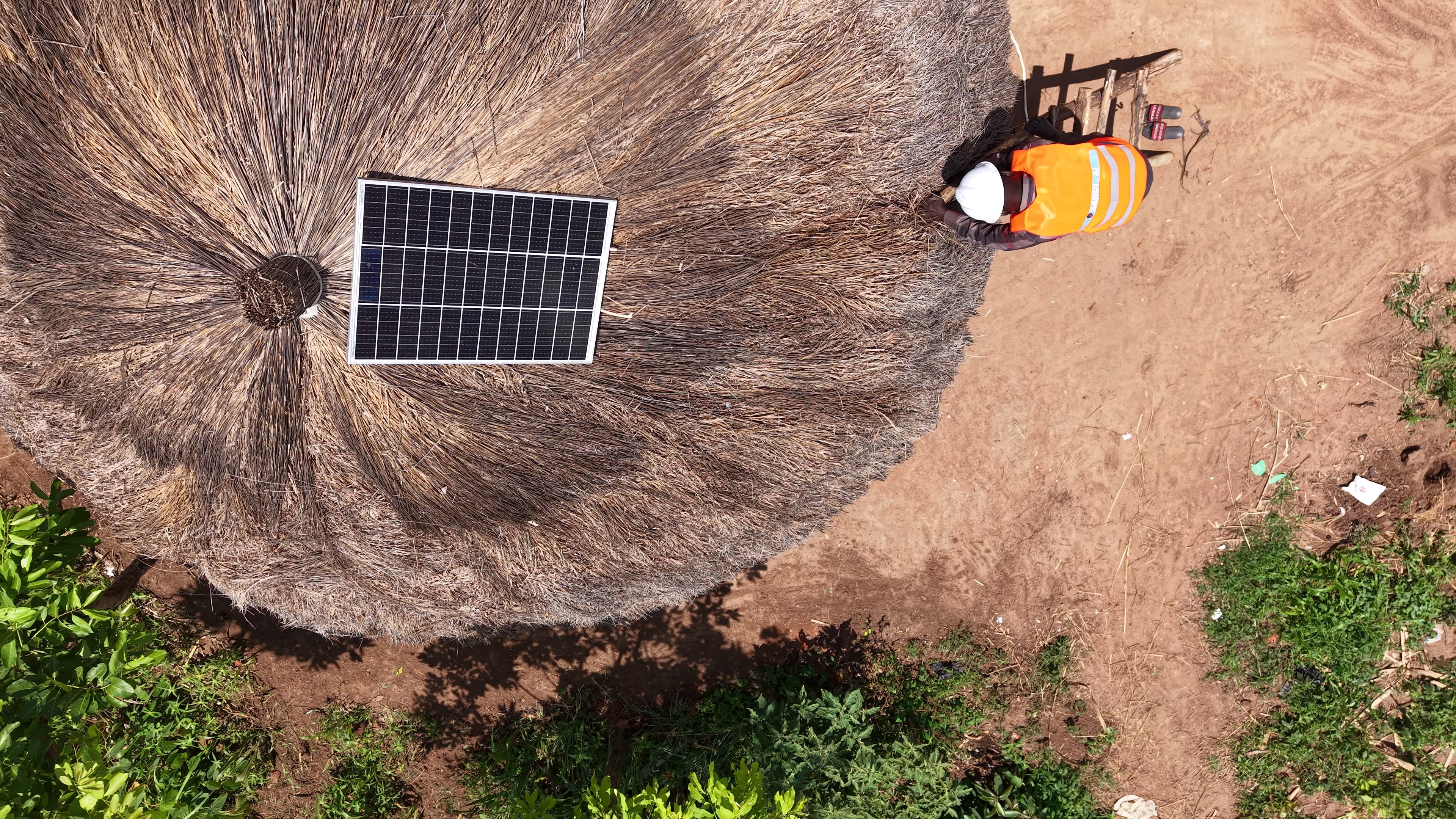 Solar panel installed on a thatched roof
